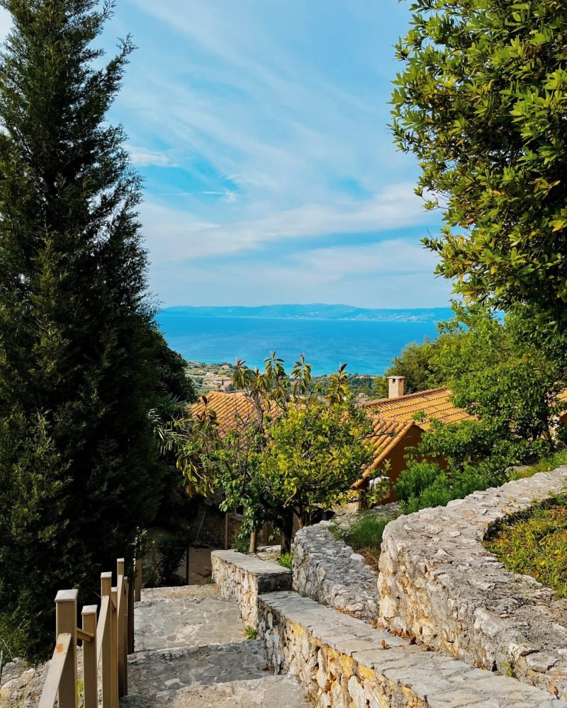 Stone steps overlooking the sea in Old Skala | Villa Oli